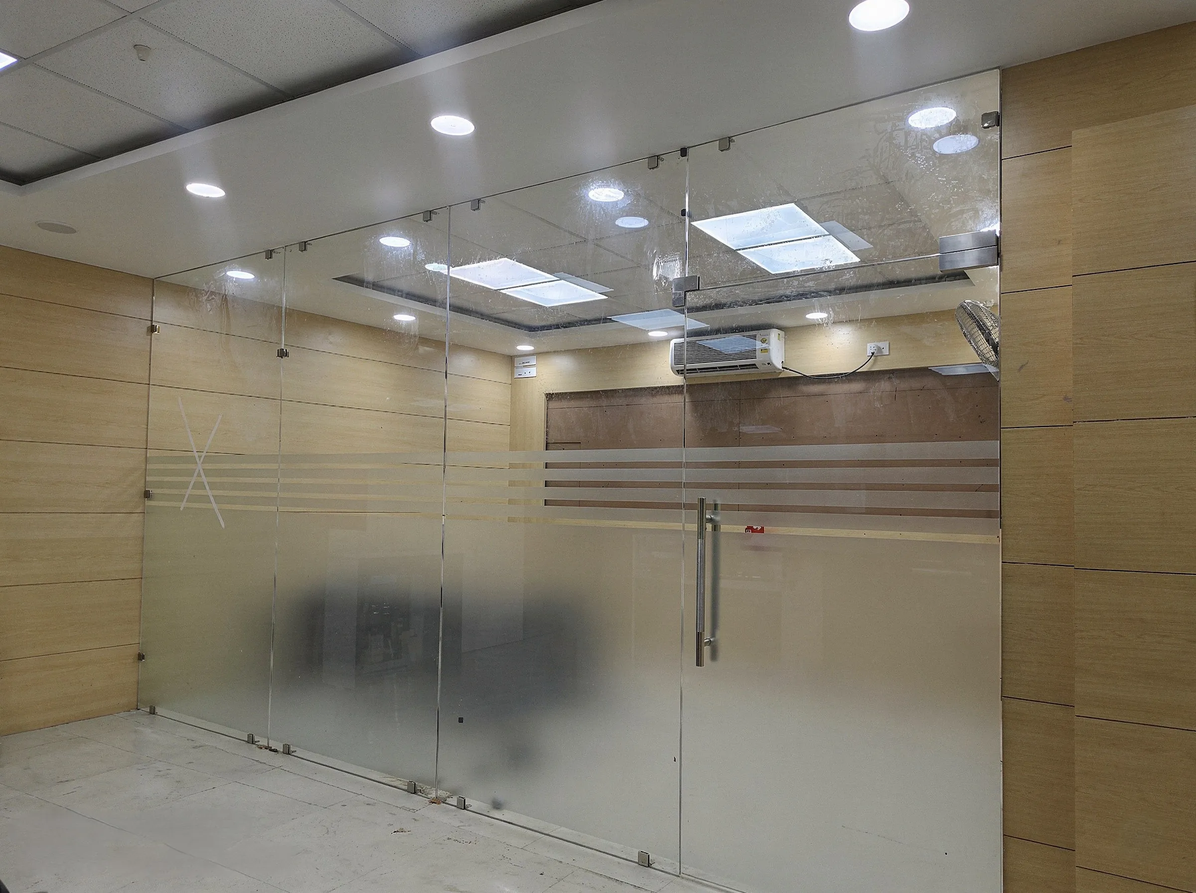 Toughened Glass Partition & Office Cabin Design in Haldwani Rudrapur Uttarakhand Uttarpradesh (Frameless Glass Door & Wooden Wall Paneling)